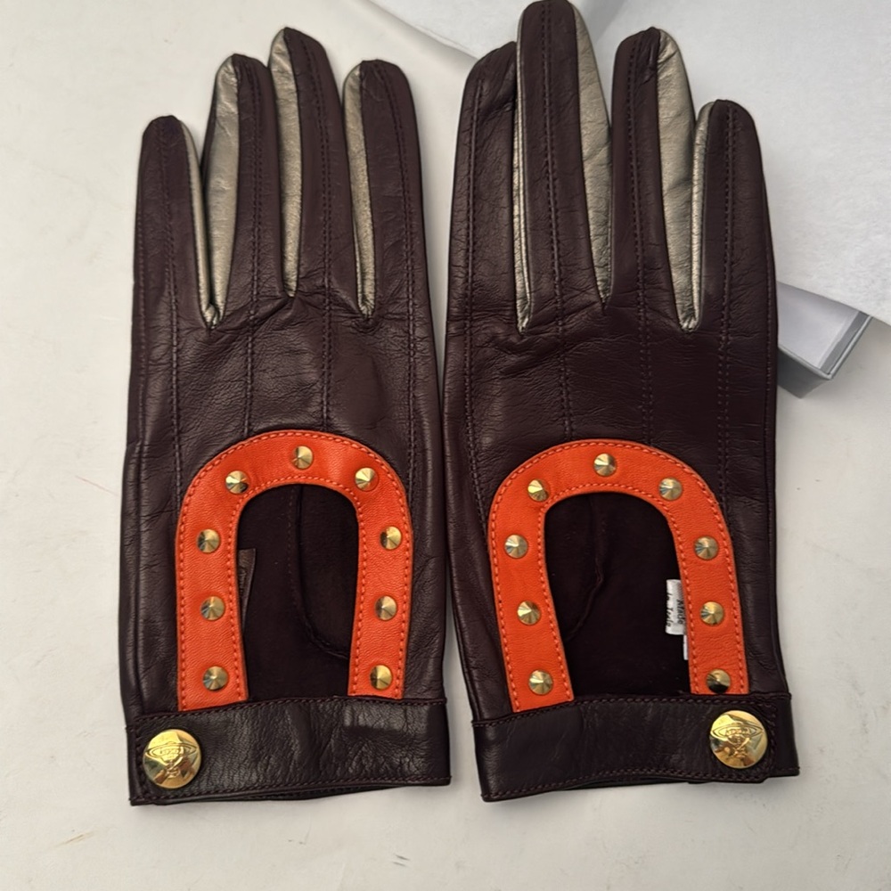 VIVIENNE WESTWOOD
BRAND NEW VINTAGE GLOVES ORANGE/BROWN/SILVER LEATHER WSTUDS M - Picture 4 of 17